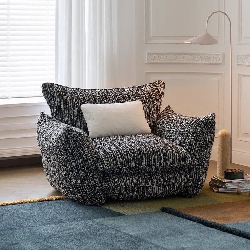 Fauteuil lounge cocon en chenille chinée noir et écru – Soft Nest