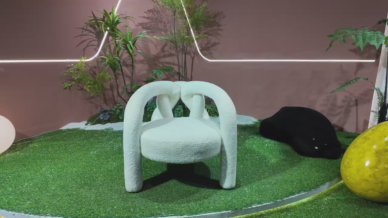 Fauteuil design en tissu bouclé entrelacé – NOEUD